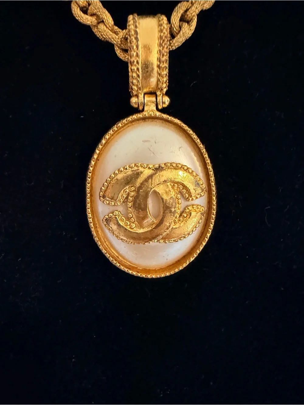 CHANEL Gold and White Oval CC Pendant Necklace